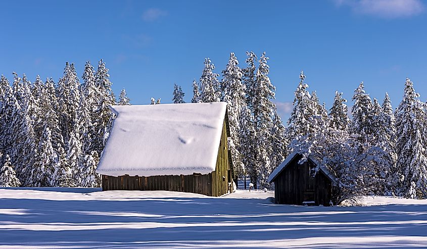 Snow layered on a barn roof north of Hayden, Idaho.