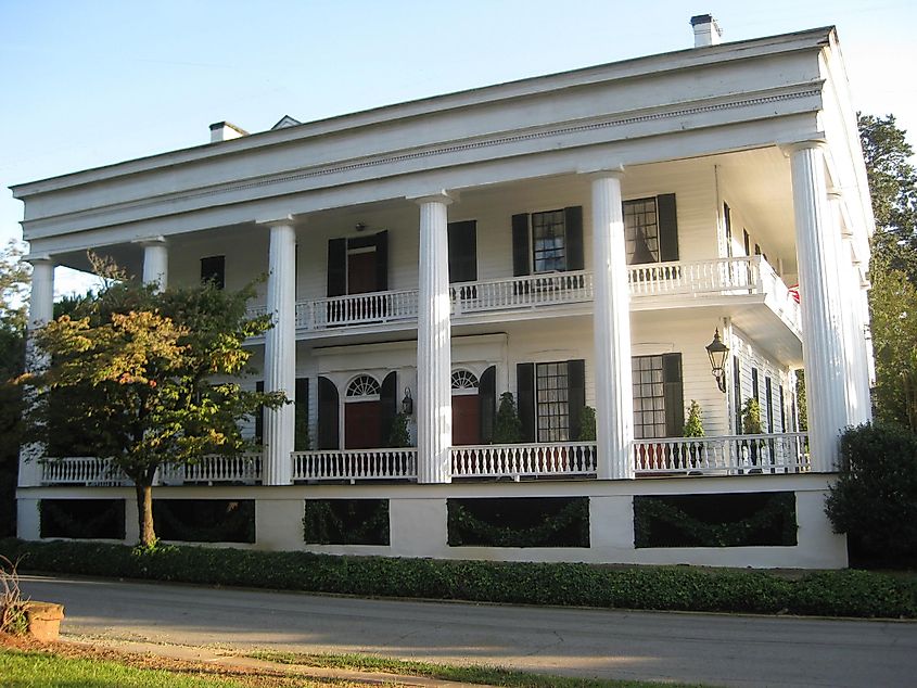 Southern mansion in Washington, Georgia, featuring Greek revival-style architecture with massive columns, known as the Campbell-Jordan House.