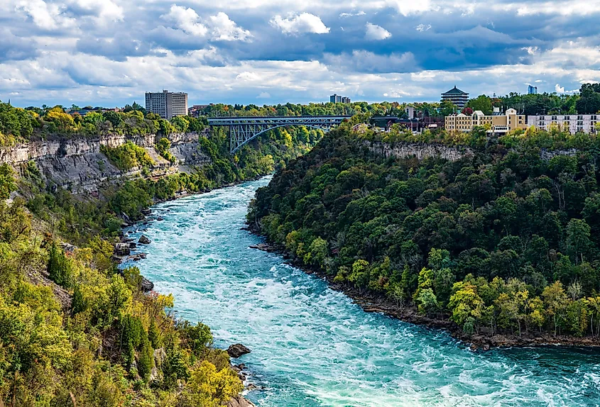 Whirlpool Rapids Bridge crosses Niagara River between Niagara Falls in New York and Niagara Falls in Ontario.