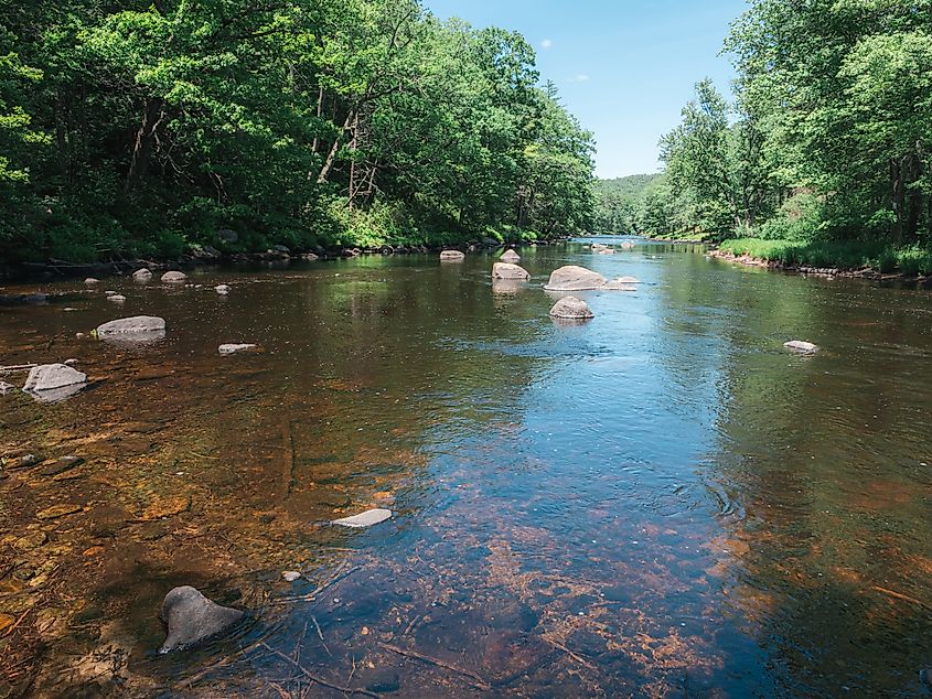 A bright summer day on the Millers River in the Bearsden Conservation Area in Athol Massachusetts