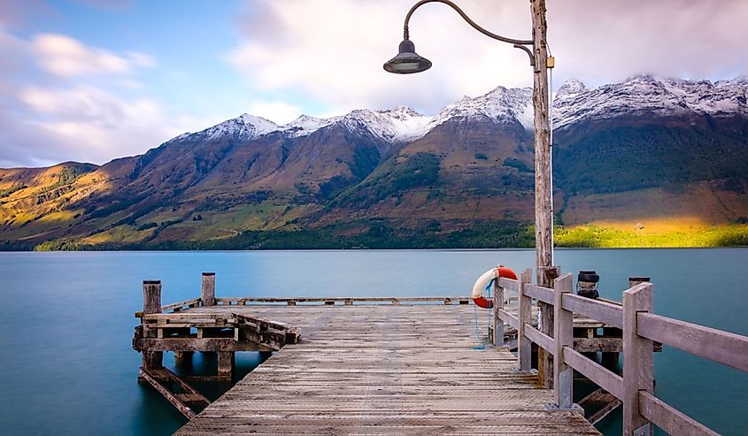 Glenorchy wharf wooden pier and lamp after sunrise, South island of New Zealand
