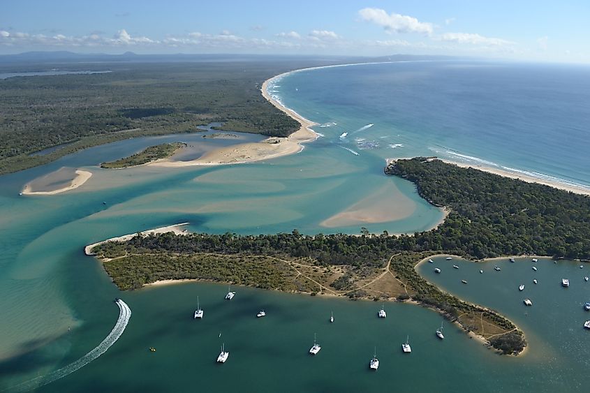 Aerial view over the mouth of the Noosa River where it meets the sea, Australia
