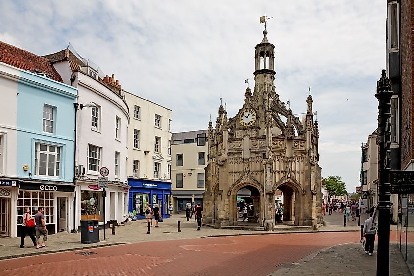 A medieval market cross stands at the junction of four streets in Chichester, England.