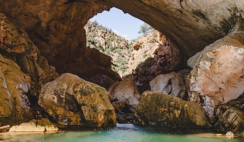 Tonto Natural Bridge: Arizona's hidden gem, a majestic limestone arch carved by nature's forces.