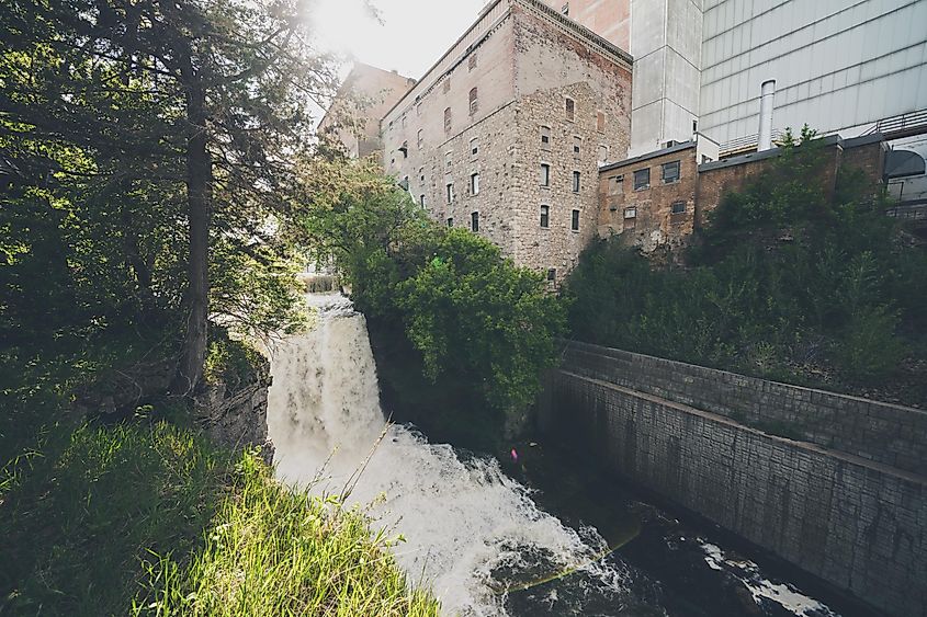 Vermillion Falls Park featuring an urban waterfall beside an old factory in Hastings, Minnesota.