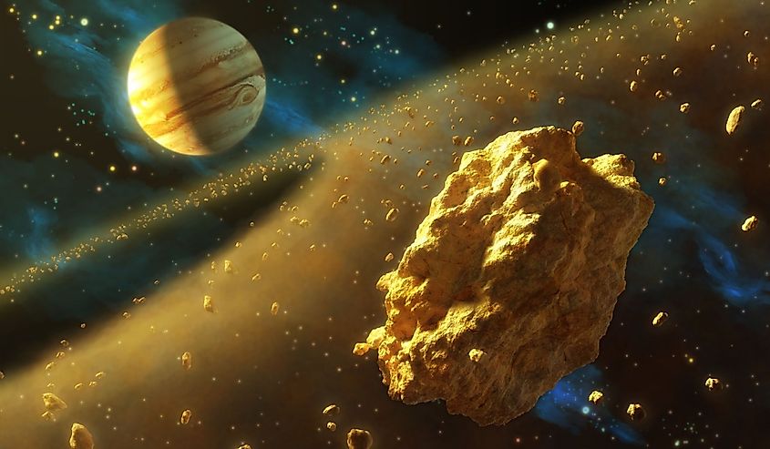 Asteroids belt in outer space, with Jupiter on background.