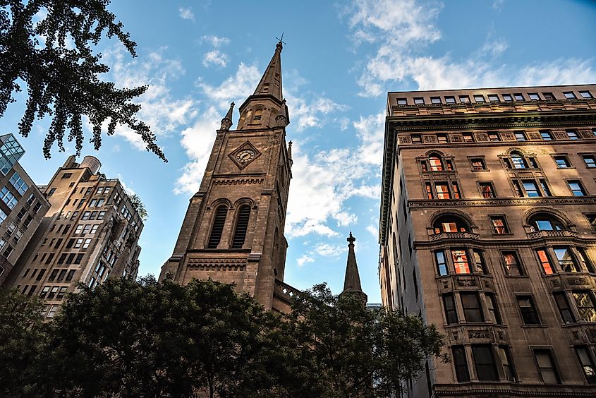 The Tower of Marble Collegiate Church among the buildings of Manhattan, New York City.