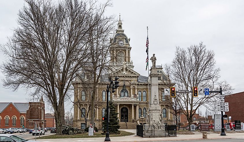 Guernsey County Courthouse, built in 1883 with the Guernsey County Civil War Memorial in front, Cambridge, Ohio.