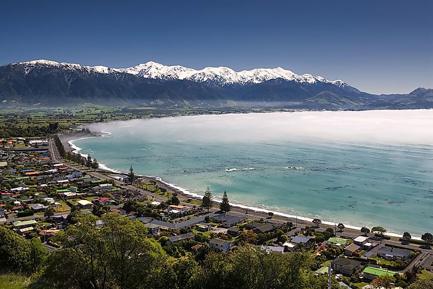 Kaikoura township with clearing morning fog, South Island, New Zealand