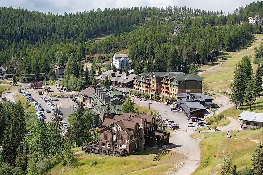Mountain ski resort, aerial view during summer day, via Alexander Oganezov / Shutterstock.com