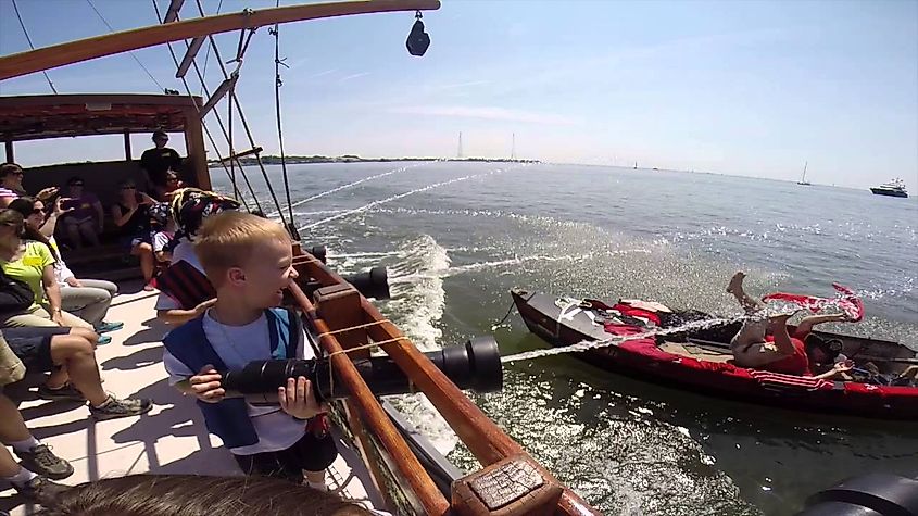 People enjoying the Pirate Adventures on the Chesapeake Bay in Maryland, via