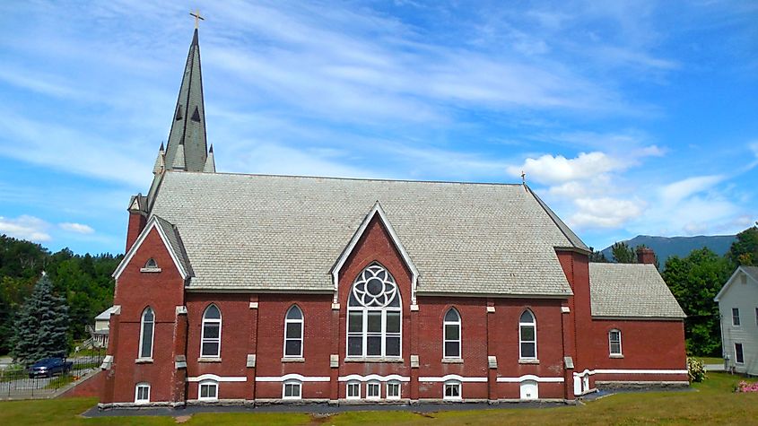Southern side of St. Thomas Catholic Church in Underhill Center, Vermont, with Mount Mansfield in the background
