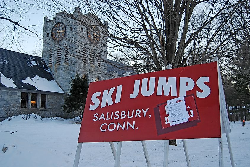 The largest and brightest sign in downtown Salisbury, Connecticut points the way to the ski jump at Satre Hill, Connecticut.