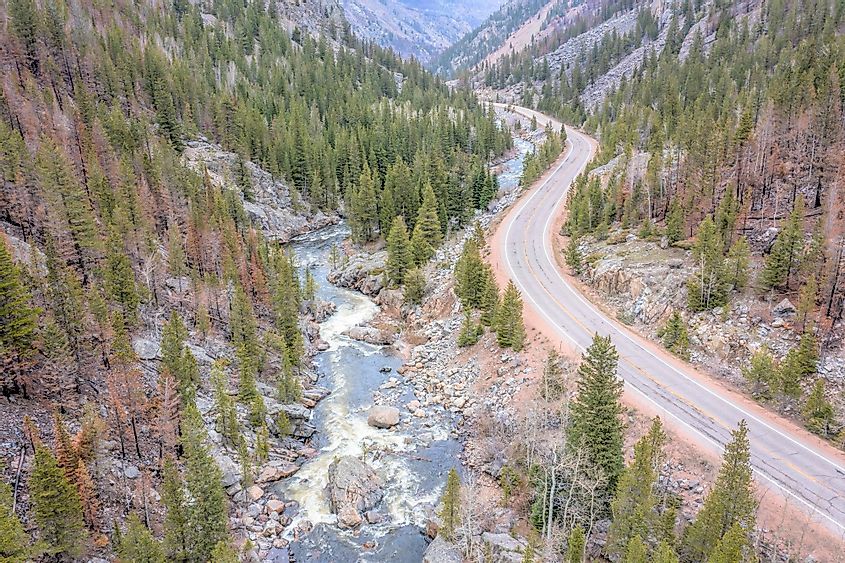 Aerial view of the Cache La Poudre River and highway at Poudre Falls in spring