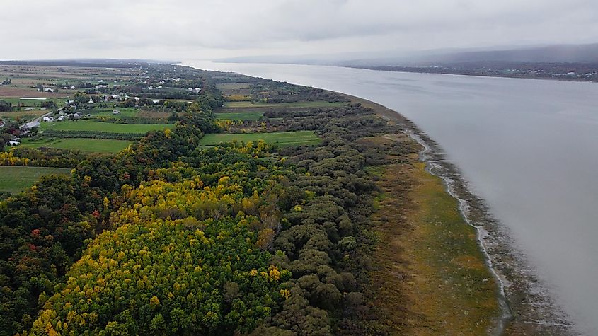 Cultivated fields by the St-Lawrence river overlooking Les Pelerins islands in Notre-Dame-du-Portage, Quebec