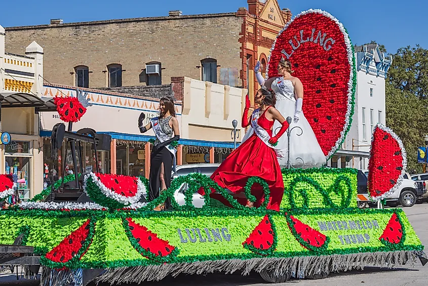 The Watermelon Thump parade moving through downtown Luling, Texas.
