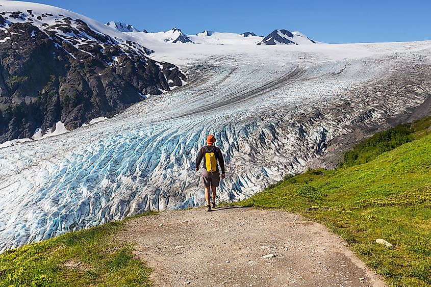 Hiking Harding Icefield trail in Kenai Fjords National Park with Exit Glacier in the background.