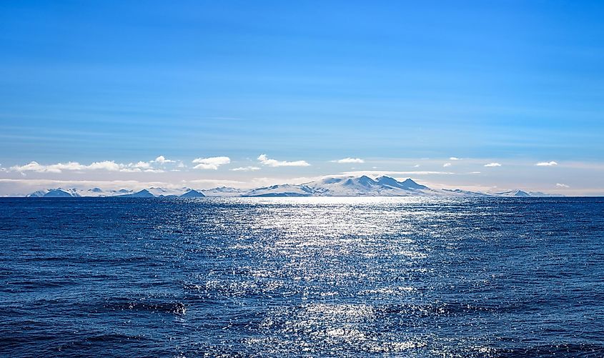 Snow peaks, glaciers and rocks of Unimak Island.