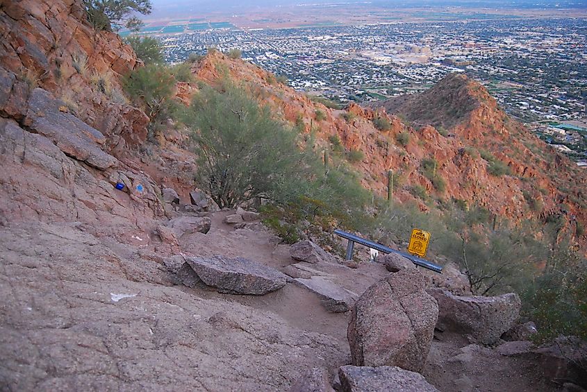 Cholla Trail on Camelback Mountain, one of the most popular hiking destinations in the Phoenix Valley, around sunset, via James Ahmed / Shutterstock.com