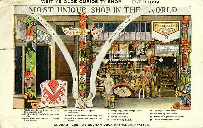 This 1922 postcard shows Ye Olde Curiosity Shop in its home at that time on Colman Dock. 