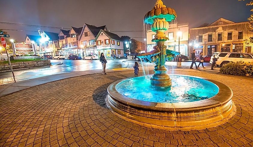 City streets with tourists at night in fall season, Bar Harbor, Maine