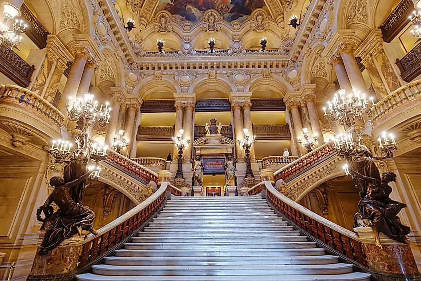 The grand staircase of the Palais Garnier opera house in Paris, France. 
