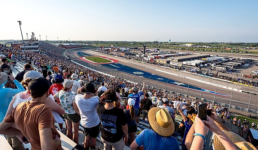 Fans watch their favorite drivers race at Iowa Speedway.