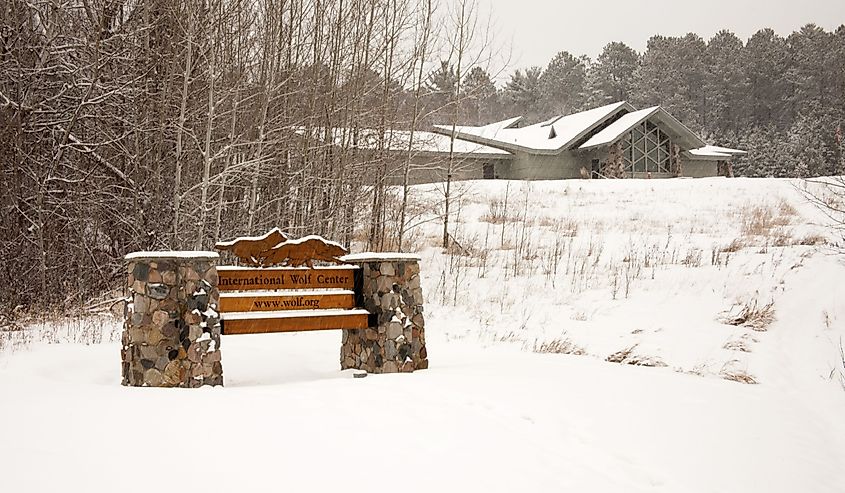 Sign in front of the International Wolf Center in Ely, Minnesota houses several Great Wolves