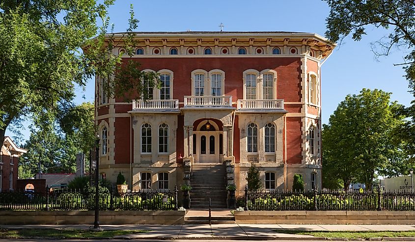 Exterior of the historic Reddick Mansion, built in 1855, on a beautiful summer morning in downtown Ottawa, Illinois.