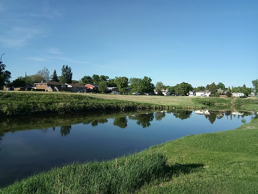 Swift Current River in Saskatchewan with calm water flowing through a natural landscape