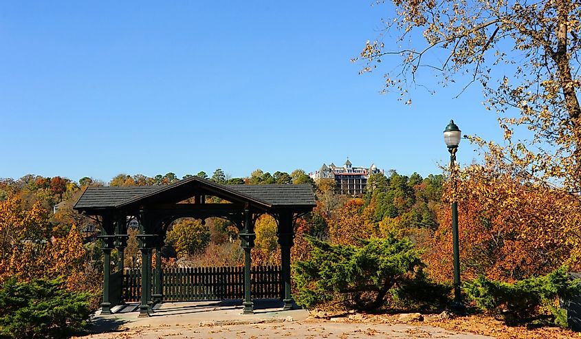 East Mountain Overlook, the Crescent Hotel rises above the orange and gold of autumn in Eureka Springs, Arkansas.