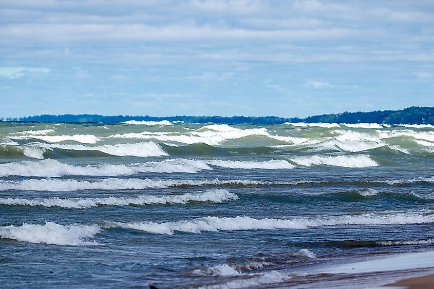 Large waves on Lake Michigan in summer creating dangerous swimming conditions
