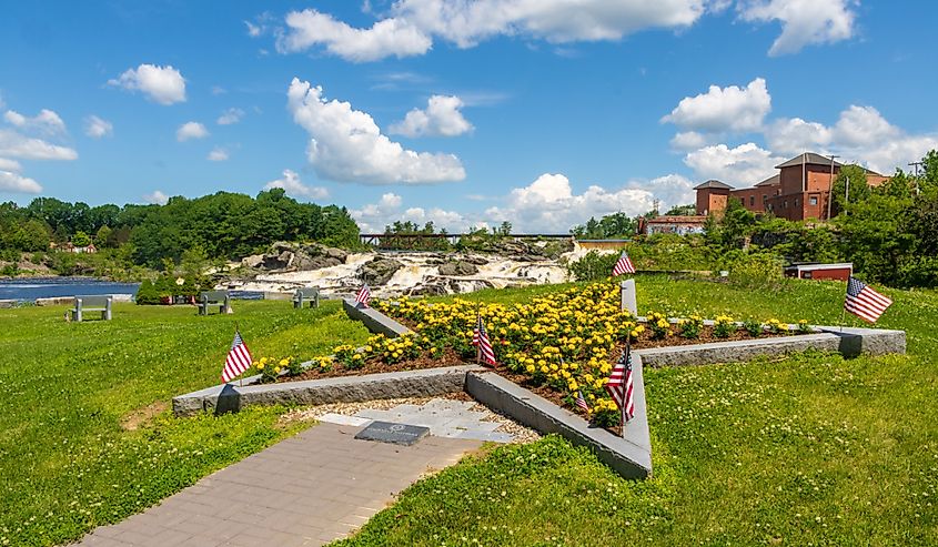 Gold Star Mothers memorial in Veterans Memorial Park with Lewiston Falls in the background, Lewiston, Maine 