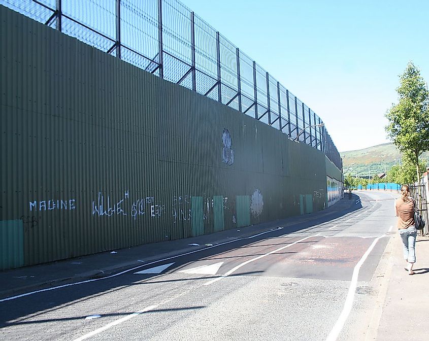 The "peace line" or "peace wall" along Cupar Way/Cepar Way in Belfast, Northern Ireland