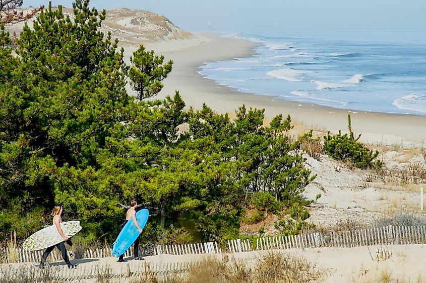 Surfers approach Herring Point in Cape Henlopen State Park.