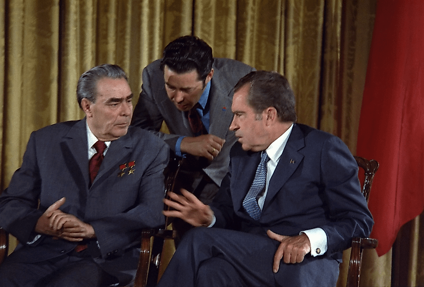 Leonid Brezhnev (left), Viktor Sukhodrev (center), and Richard Nixon (right) during Brezhnev's 1973 visit to Washington, D.C., a high-water mark in détente between the United States and the Soviet Union