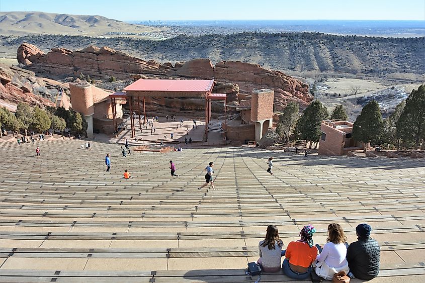 Visitors enjoy the ambiance at the Red Rocks Amphitheater. aEditorial credit: Jim Lambert / Shutterstock.com