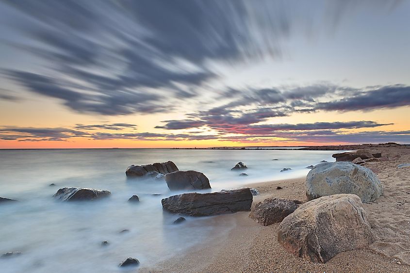 Dusk at a Rocky Beach in Hammonasset State Park located in the county of Madison, Connecticut.