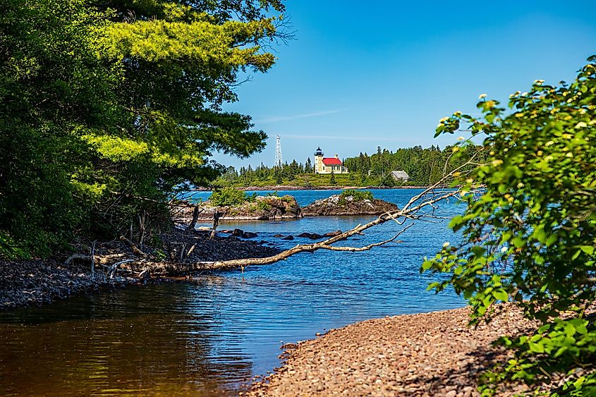 view of the lighthouse overlooking Copper Harbor, Michigan, with a tributary in the foreground.