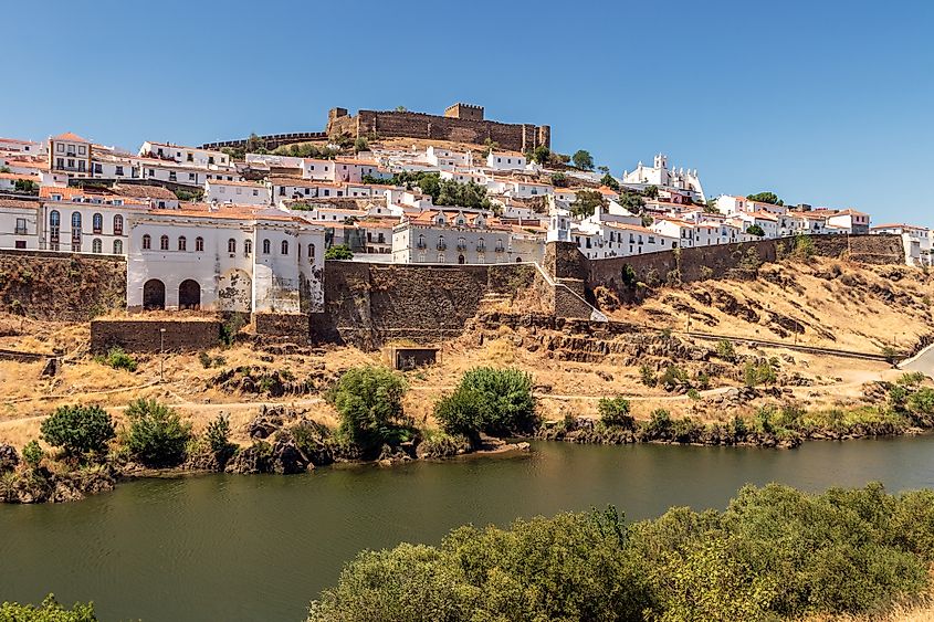 The town of Mértola, Portugal from the Guadiana River.