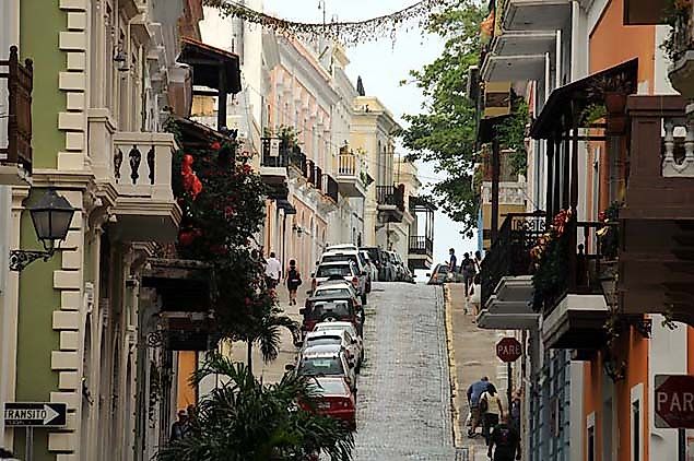 buildings along a nartrow stret in san juan