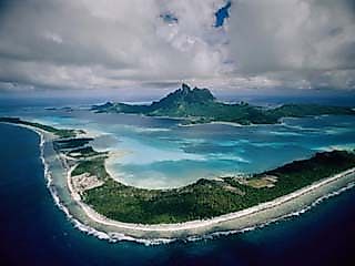 Aerial View of Bora-Bora, its White Beaches Ringed by a Coral Reef