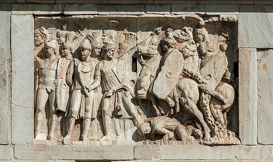 Relief of a battle scene between the Roman legion and Barbarians from Rome. Image credit: Cris Foto / Shutterstock.com