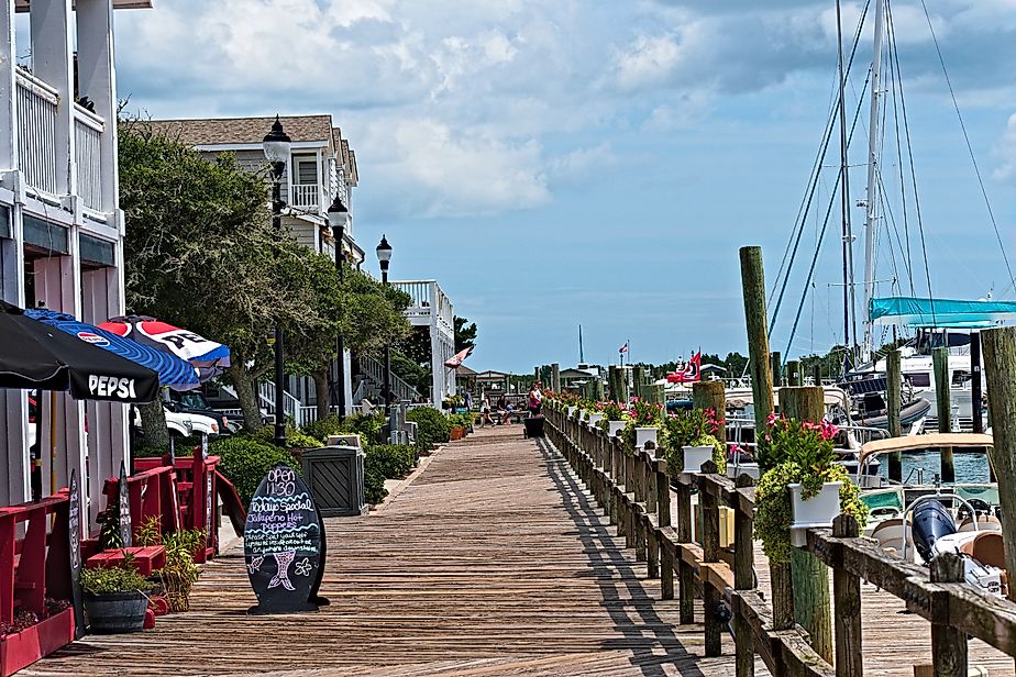 Beaufort waterfront offers a beautiful boardwalk with access to stores and restaurants as well as a beautiful view of Taylor Creek. Editorial credit: Joseph D Washburn / Shutterstock.com