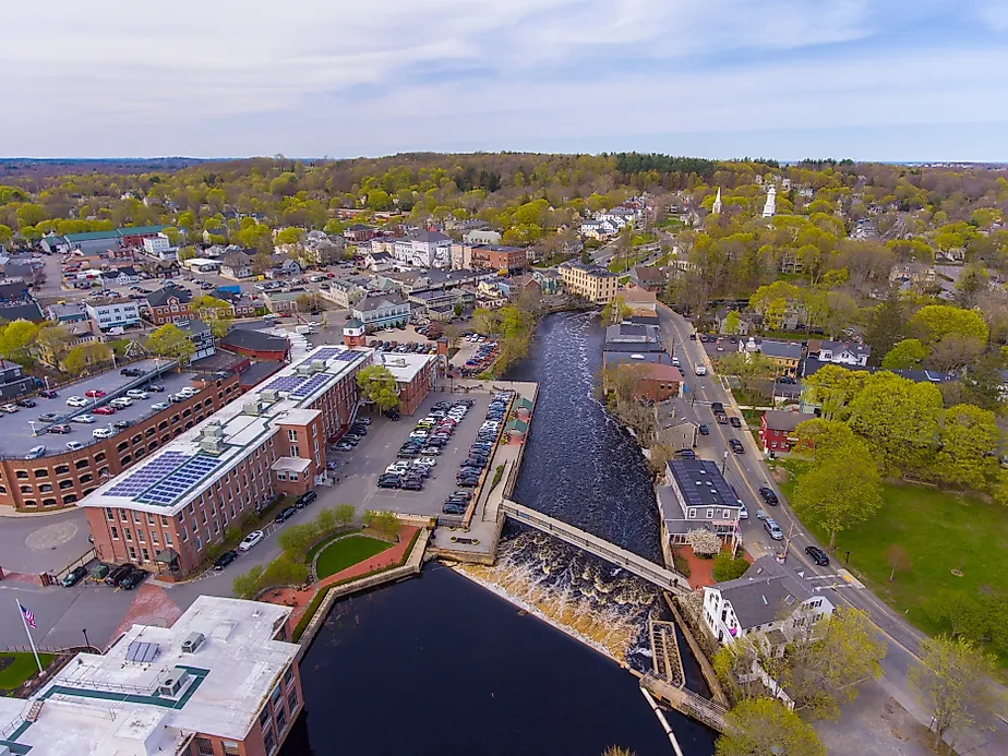 Ipswich River and Mills Dam aerial view in spring at town center of Ipswich, Massachusetts MA, USA. Via Shutterstock / Wangkun Jia
