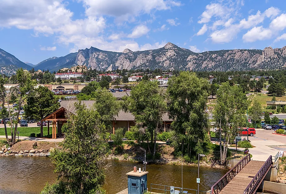 Estes Park, a sunny Summer day view of the center of the mountain resort town along Big Thompson River, Colorado.
