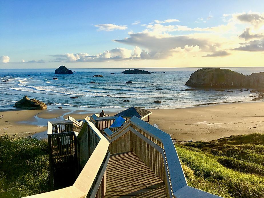 Stairway leading down to rocky beach at Coquille Point in Bandon, Oregon.