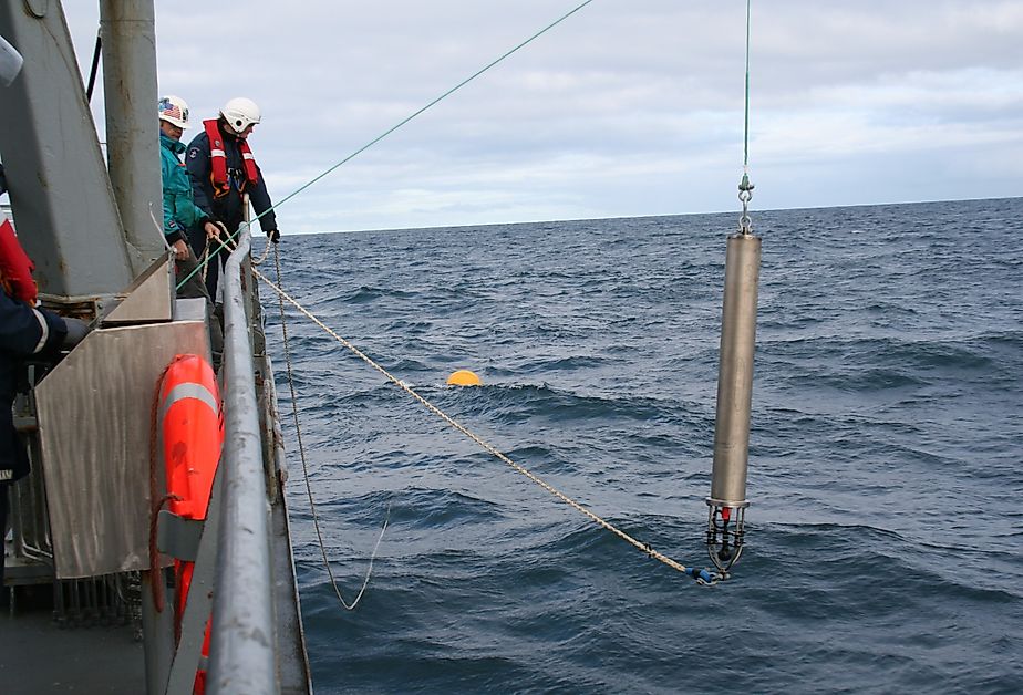 Scientists working for Oregon State University and NOAA deploy a hydrophone in the North Atlantic aboard the Icelandic Coast Guard cutter Aegir that will record sounds. Image credit Dave Mellinger/Oregon State University, CC BY-SA 2.0, via Wikimedia Commo