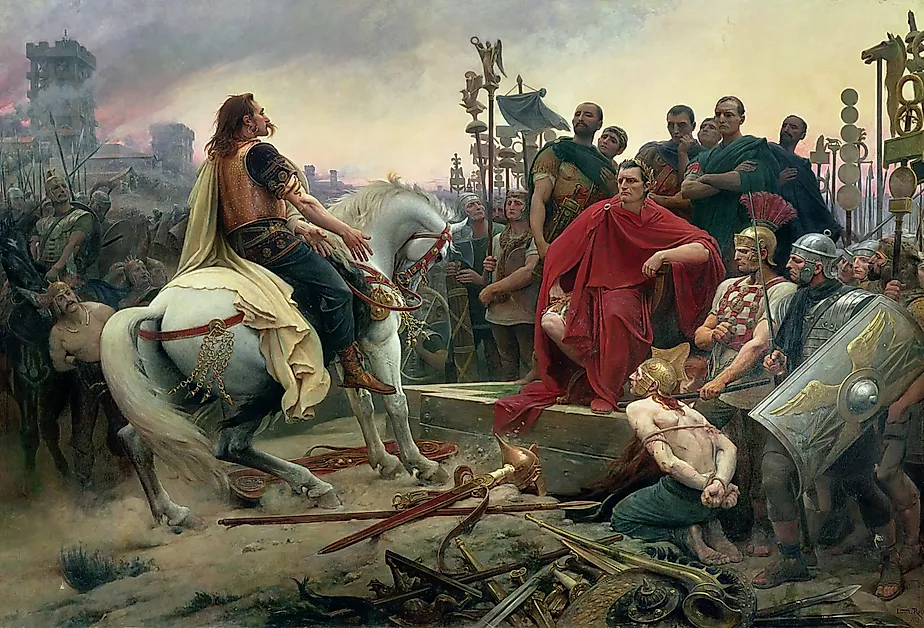Vercingetorix surrenders to Julius Caesar following the Battle of Alesia in 52 BCE, as imagined by Lionel Royer in 1899. Image credit Lionel Royer, Public domain, via Wikimedia Commons