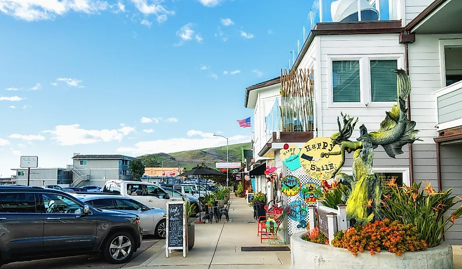 Antique stores, restaurants, historic buildings, steps from the beach, in Cayucos, California. Image credit HannaTor via Shutterstock